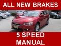 Rally Red Pearl 2009 Mitsubishi Lancer ES