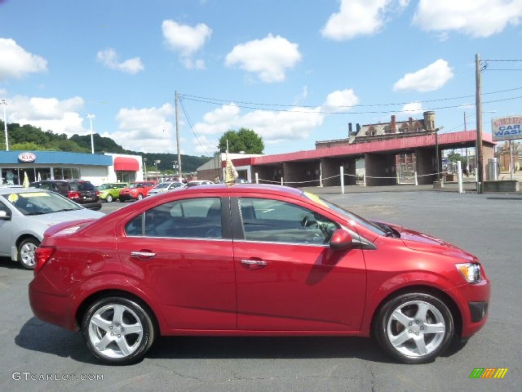 2013 Sonic LTZ Sedan - Crystal Red Tintcoat / Jet Black/Dark Titanium photo #1