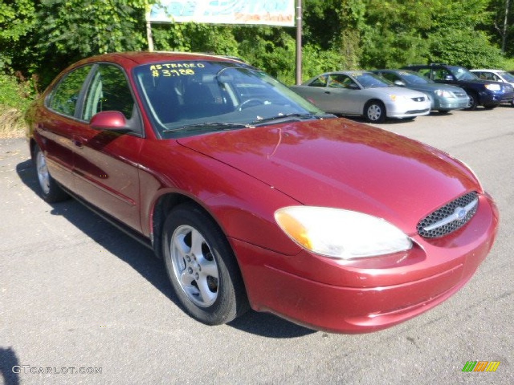 2003 Taurus SE - Matador Red Metallic / Dark Charcoal photo #4