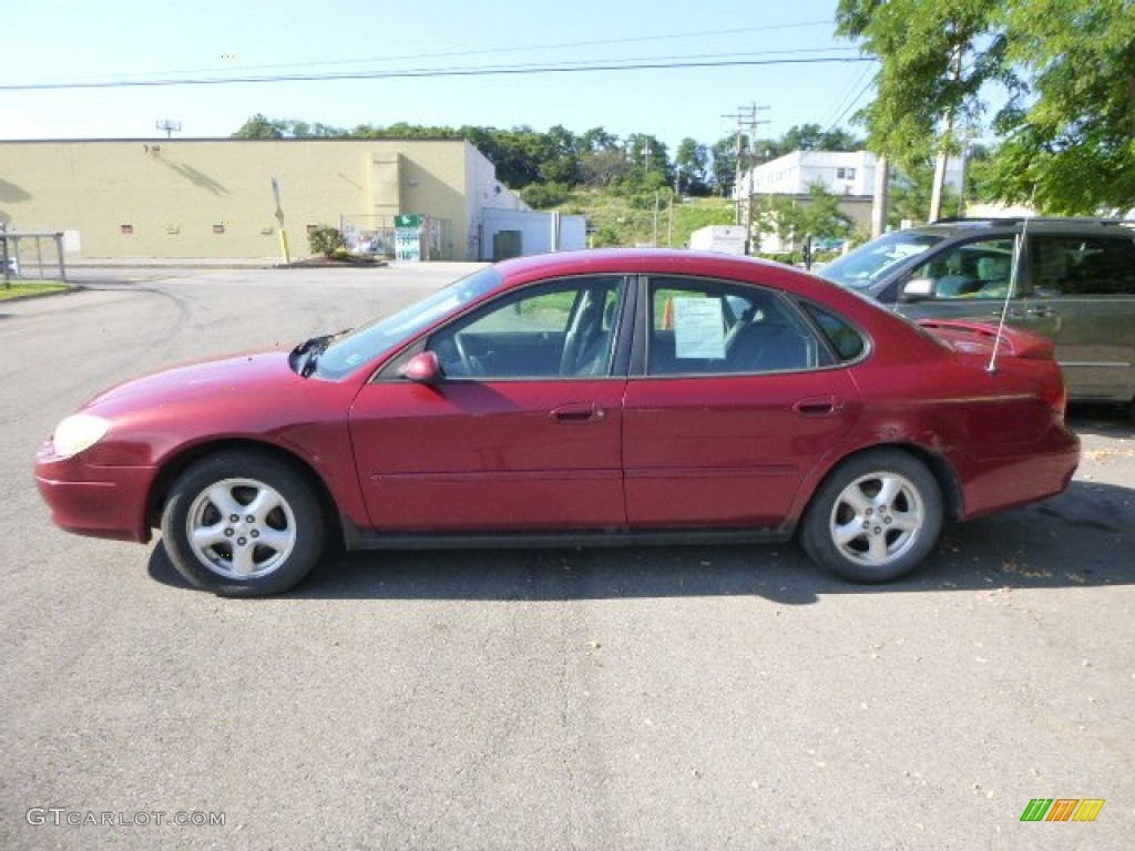 2003 Taurus SE - Matador Red Metallic / Dark Charcoal photo #5