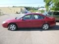 2003 Matador Red Metallic Ford Taurus SE  photo #5