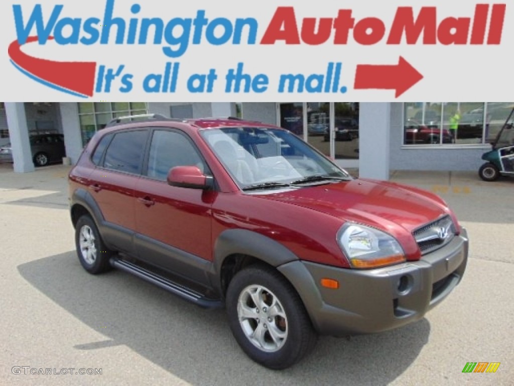 2009 Tucson SE V6 4WD - Mesa Red / Gray photo #1