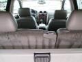 2002 Magnetic Red Metallic GMC Envoy SLT 4x4  photo #26