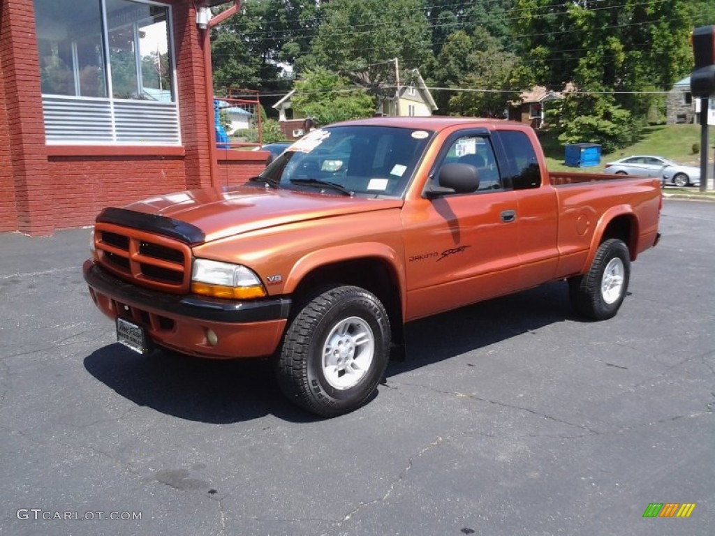 Amber Fire Pearl 2000 Dodge Dakota Sport Extended Cab 4x4 Exterior Photo #95695907