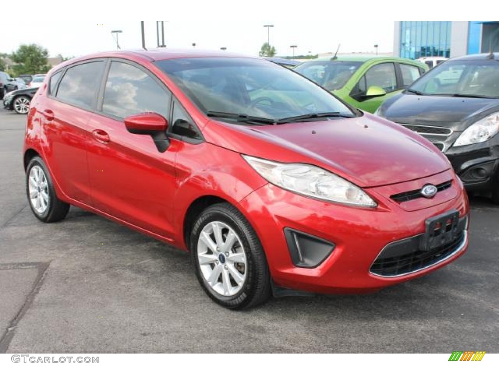 2011 Fiesta SE Hatchback - Red Candy Metallic / Light Stone/Charcoal Black Cloth photo #2