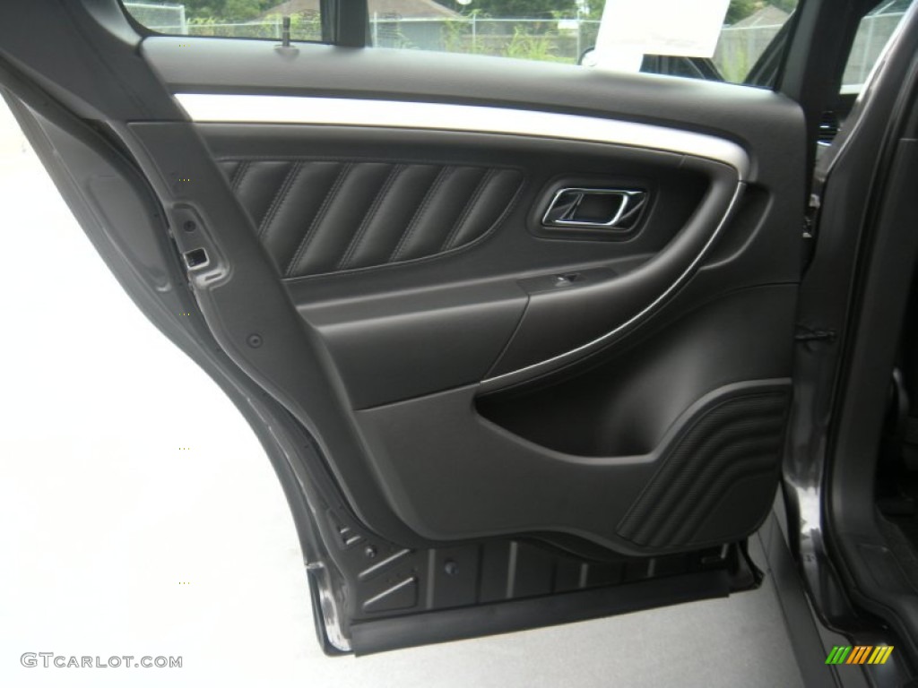 2015 Ford Taurus SEL Charcoal Black Door Panel Photo #95982829