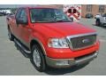Bright Red 2004 Ford F150 Lariat SuperCab