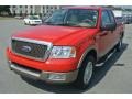 2004 Bright Red Ford F150 Lariat SuperCab  photo #2