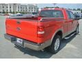 2004 Bright Red Ford F150 Lariat SuperCab  photo #5