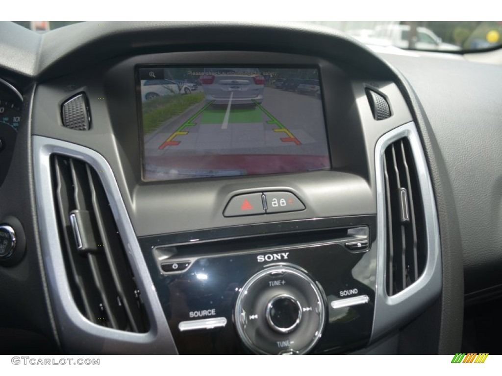 2014 Focus Titanium Sedan - Ruby Red / Charcoal Black photo #25