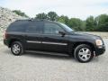 2004 Onyx Black GMC Envoy XL SLT 4x4  photo #38