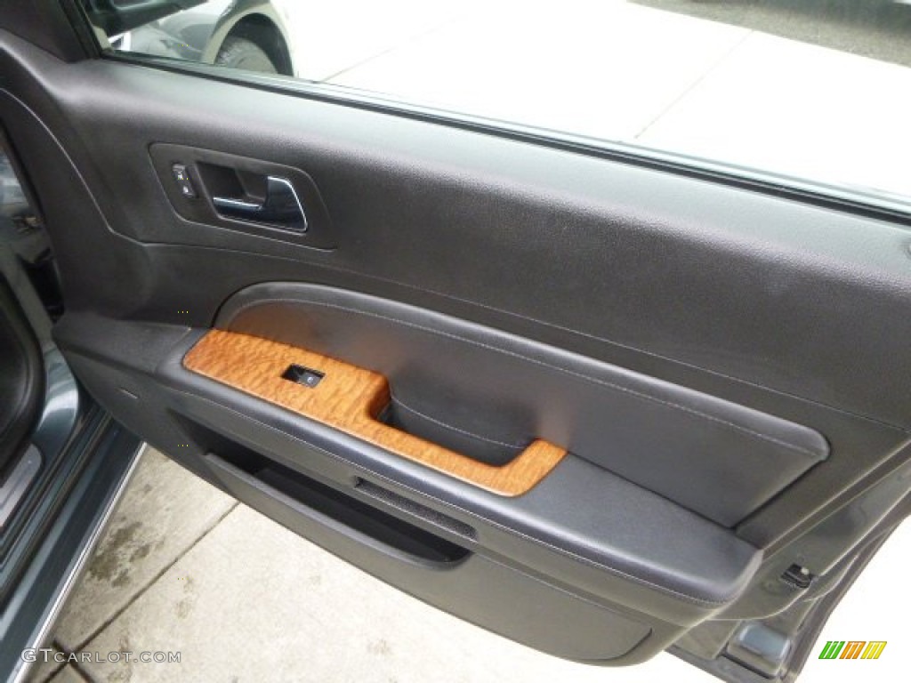 2009 Cadillac STS 4 V6 AWD Ebony Door Panel Photo #96309182