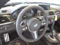 Ivory White and Black 2015 BMW 4 Series 435i xDrive Gran Coupe Steering Wheel