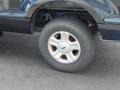 2005 Ford F150 STX SuperCab 4x4 Wheel and Tire Photo