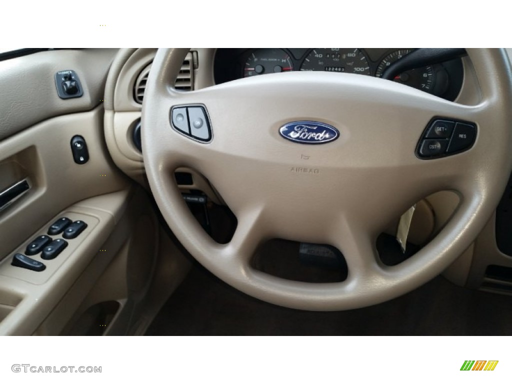 2003 Ford Taurus SE Medium Parchment Steering Wheel Photo #96579827