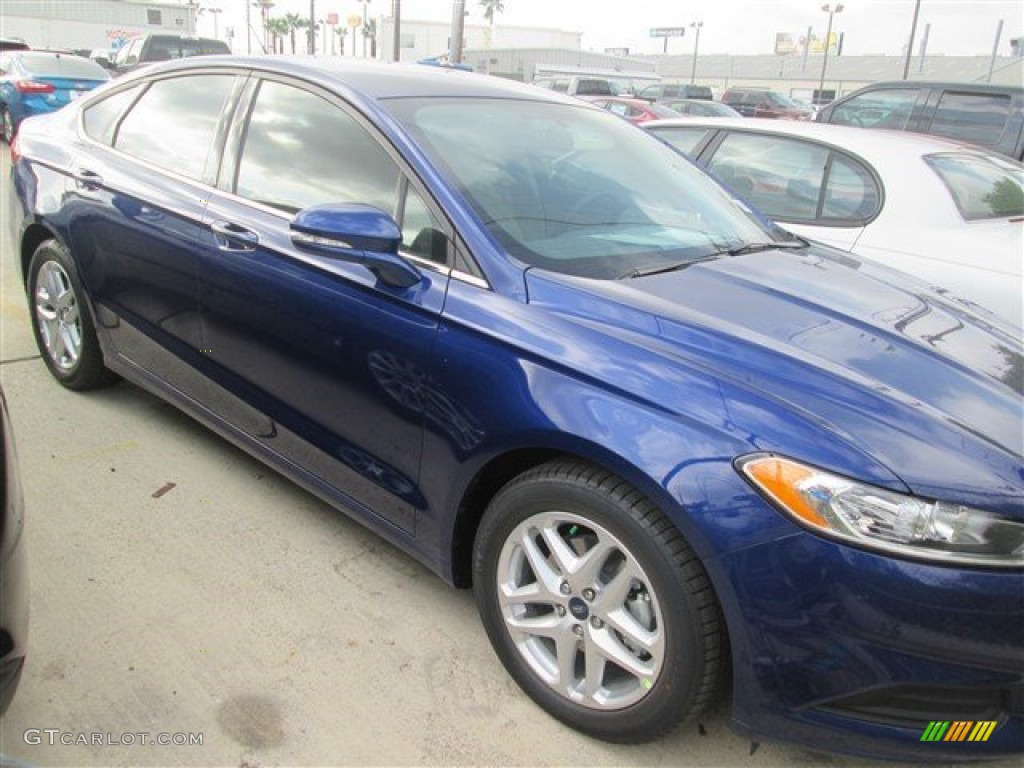 2015 Fusion SE - Deep Impact Blue Metallic / Dune photo #18