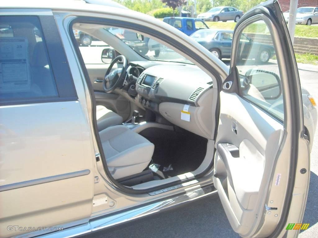 2009 Outlander SE 4WD - Desert Sand Beige Metallic / Beige photo #20