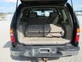 2003 Onyx Black GMC Yukon SLT 4x4  photo #28