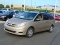 2010 Desert Sand Mica Toyota Sienna LE  photo #4