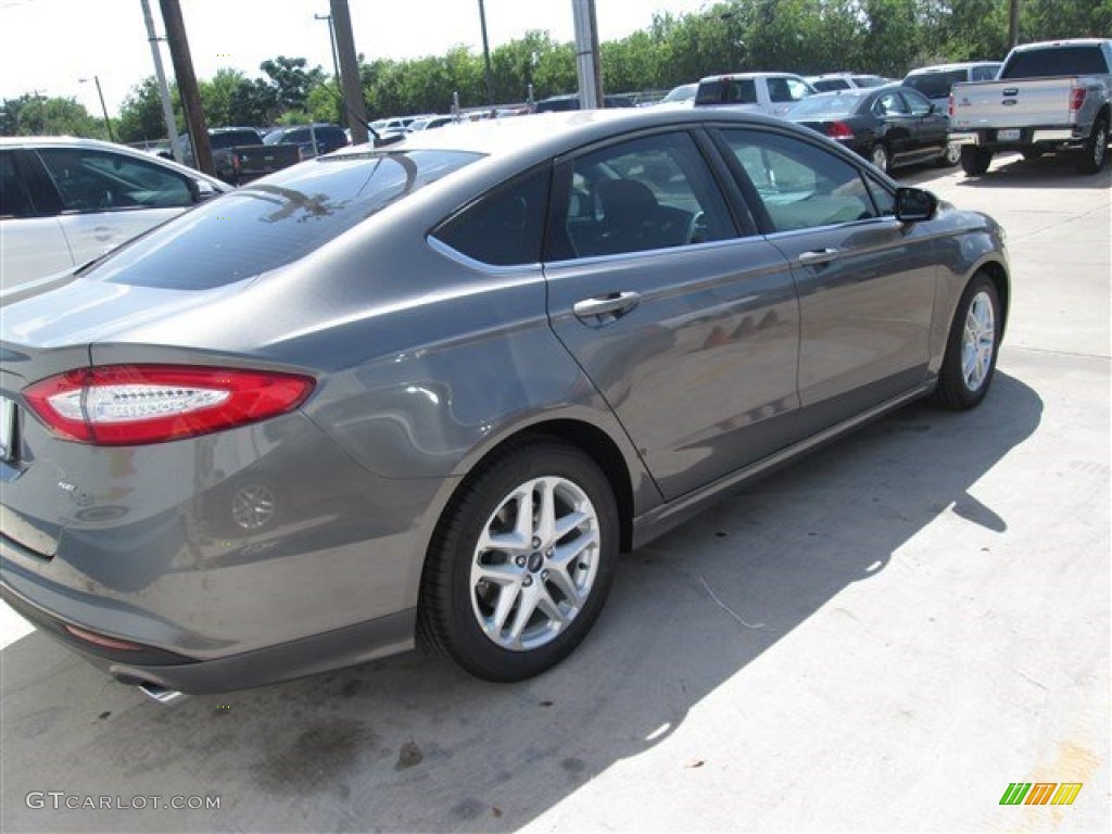 2014 Fusion SE - Sterling Gray / Charcoal Black photo #1