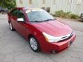 2011 Sangria Red Metallic Ford Focus SEL Sedan  photo #2