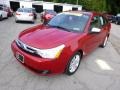 2011 Sangria Red Metallic Ford Focus SEL Sedan  photo #4