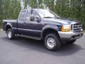 2001 True Blue Metallic Ford F250 Super Duty XLT SuperCab 4x4  photo #17