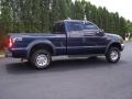 2001 True Blue Metallic Ford F250 Super Duty XLT SuperCab 4x4  photo #21