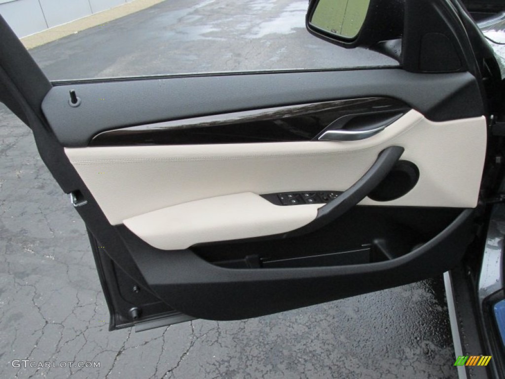 2015 BMW X1 xDrive28i Oyster/Orange-Black Piping Door Panel Photo #97195310