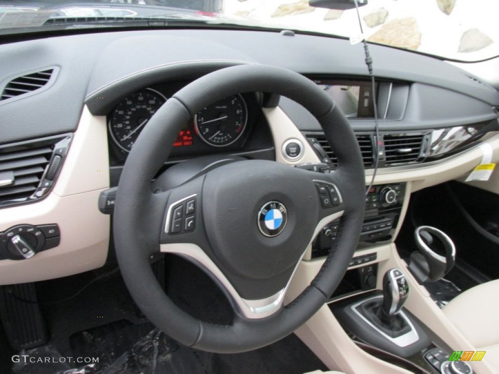 2015 BMW X1 xDrive28i Oyster/Orange-Black Piping Steering Wheel Photo #97195414