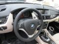 2015 BMW X1 Oyster/Orange-Black Piping Interior Steering Wheel Photo