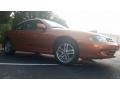 2005 Sunburst Orange Metallic Chevrolet Cavalier LS Sport Coupe  photo #2