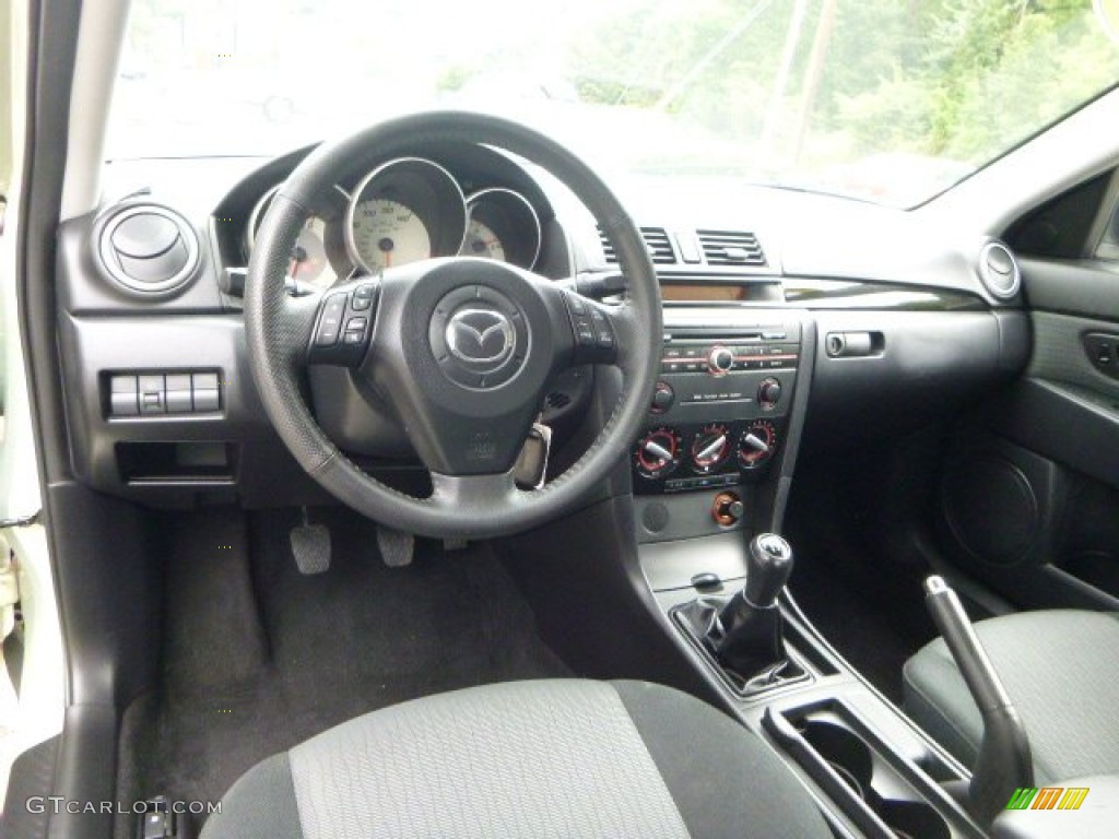 2009 MAZDA3 i Touring Sedan - Golden Sand Metallic / Black photo #17