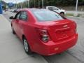 2015 Red Hot Chevrolet Sonic LS Sedan  photo #6