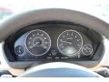 2014 BMW 3 Series Venetian Beige Interior Gauges Photo