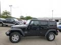 2015 Black Jeep Wrangler Unlimited Sport S 4x4  photo #2