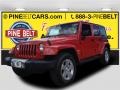 Flame Red 2011 Jeep Wrangler Unlimited Sahara 4x4