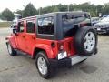 2011 Flame Red Jeep Wrangler Unlimited Sahara 4x4  photo #11