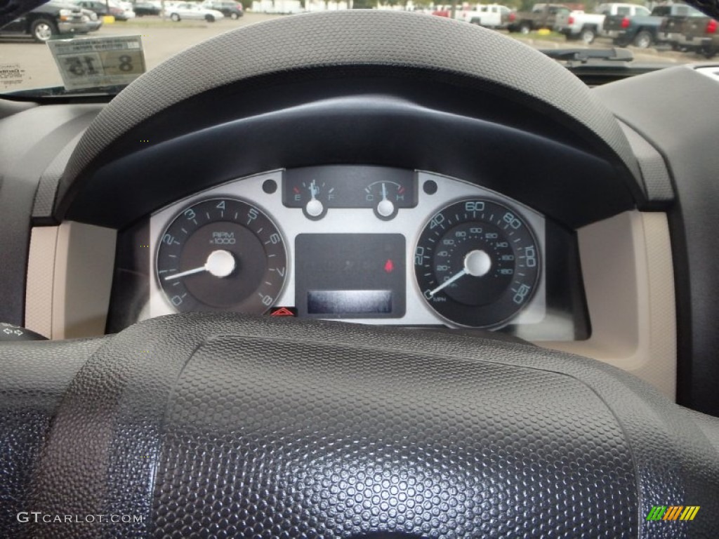 2010 Mariner I4 4WD - Steel Blue Metallic / Black photo #16