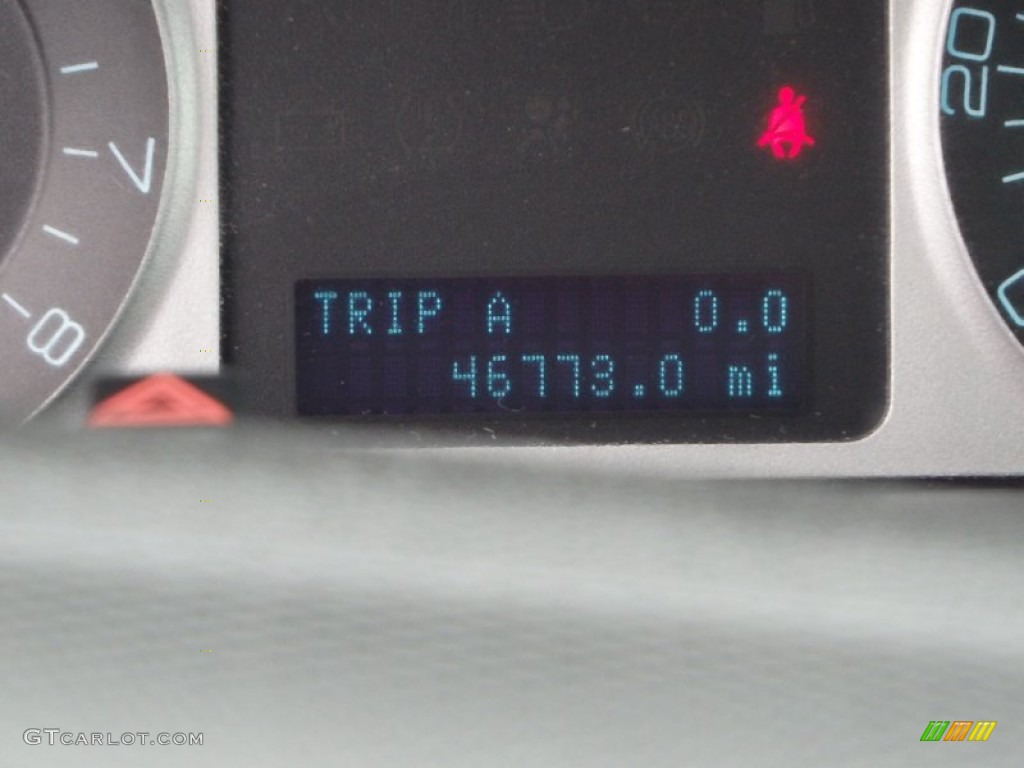 2010 Mariner I4 4WD - Steel Blue Metallic / Black photo #26