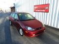 2003 Sangria Red Metallic Ford Focus ZX5 Hatchback  photo #1