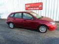 2003 Sangria Red Metallic Ford Focus ZX5 Hatchback  photo #2