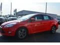 2014 Race Red Ford Focus SE Sedan  photo #3