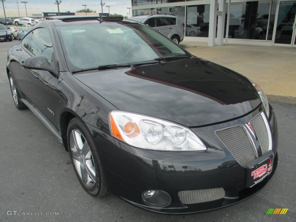 2009 G6 GXP Coupe - Carbon Black Metallic / Ebony/Light Titanium photo #1