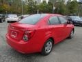 2015 Red Hot Chevrolet Sonic LS Sedan  photo #6