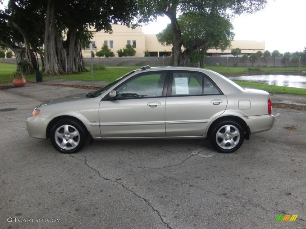 2002 Protege LX - Light Sandalwood Metallic / Beige photo #2