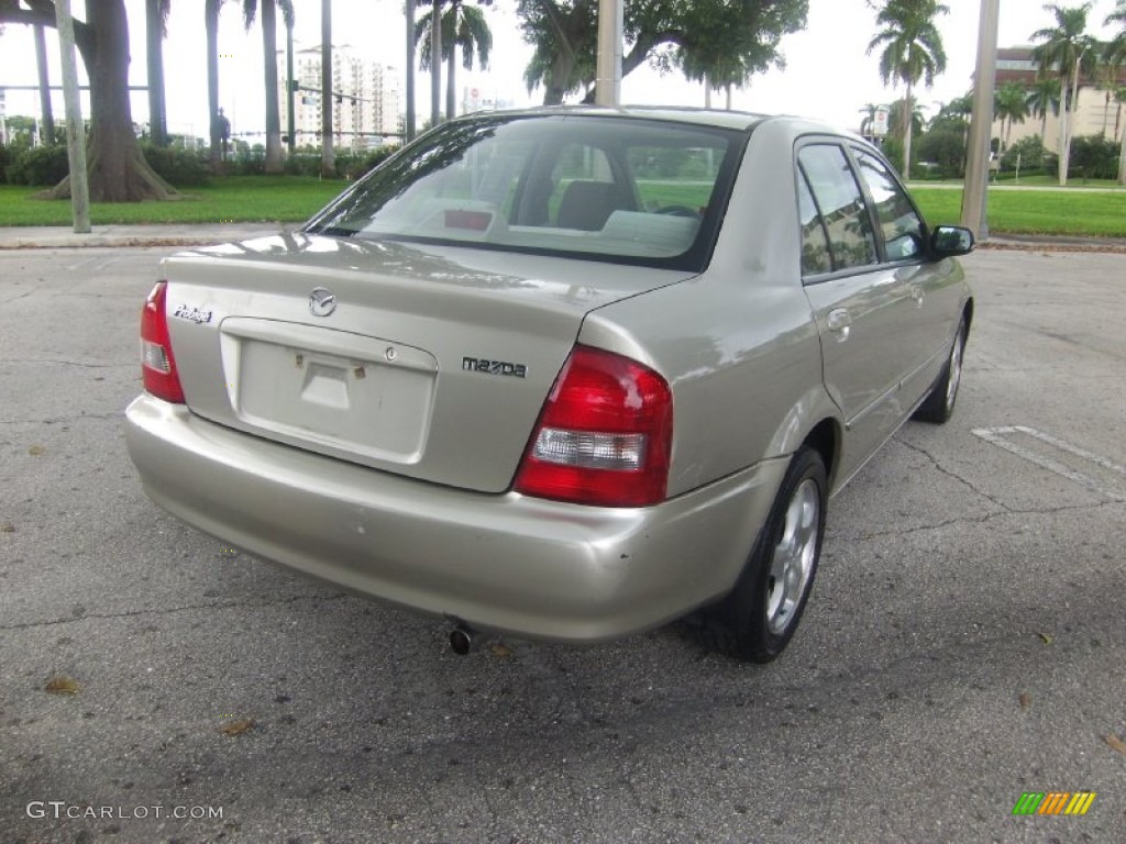 2002 Protege LX - Light Sandalwood Metallic / Beige photo #4