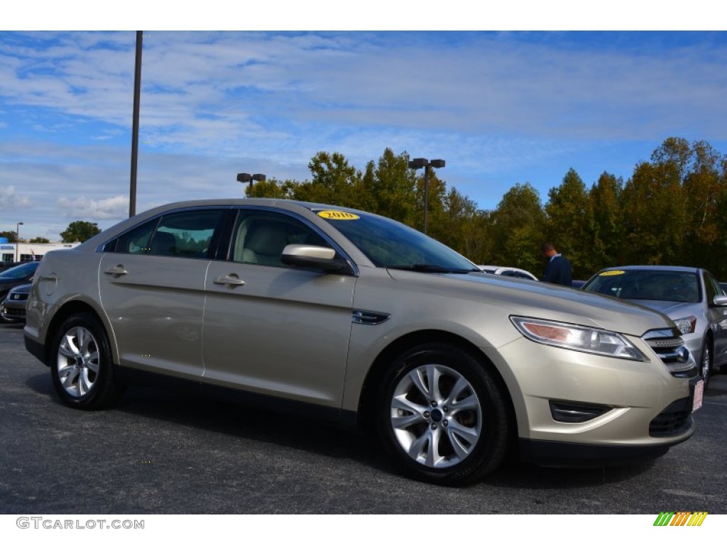 2010 Taurus SEL AWD - Gold Leaf Metallic / Light Stone photo #1