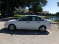 2001 Cloud 9 White Ford Focus SE Sedan  photo #2