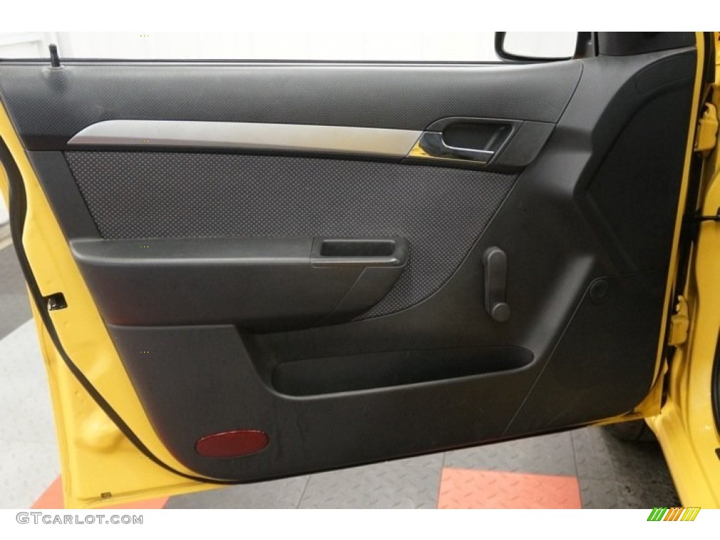 2010 Chevrolet Aveo LT Sedan Charcoal Door Panel Photo #98349420